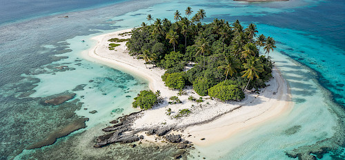 Tropical island and turquoise Indian Ocean